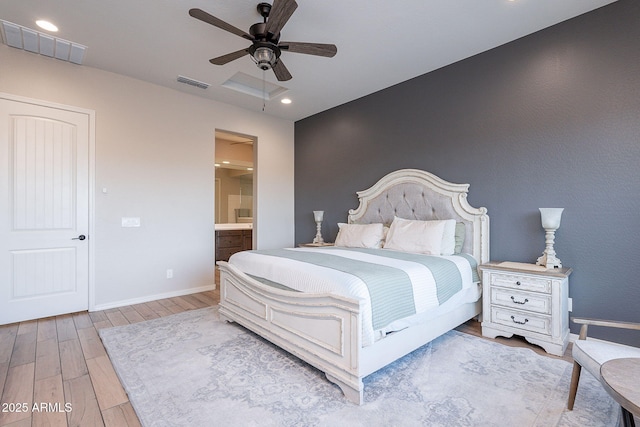 22771 N 98th Dr, Peoria, AZ 85383 - bedroom featuring wood finished floors, baseboards, connected bathroom, recessed lighting, and a ceiling fan
