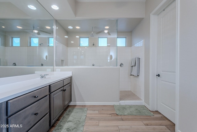 22771 N 98th Dr, Peoria, AZ 85383 - full bath featuring a ceiling fan, a walk in shower, vanity, healthy amount of natural light, and recessed lighting