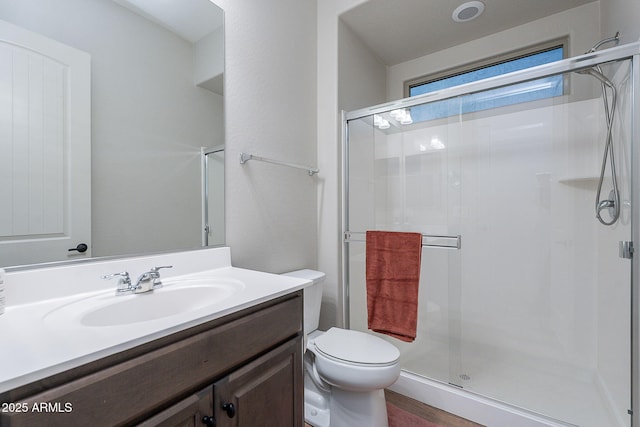 22771 N 98th Dr, Peoria, AZ 85383 - bathroom featuring a stall shower, vanity, and toilet