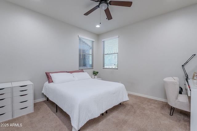 22771 N 98th Dr, Peoria, AZ 85383 - bedroom with light colored carpet, baseboards, ceiling fan, and recessed lighting