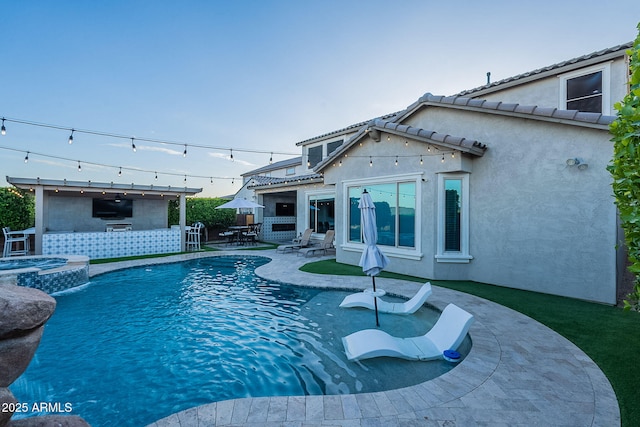 22771 N 98th Dr, Peoria, AZ 85383 - view of swimming pool with ceiling fan, a patio, and a pool with connected hot tub