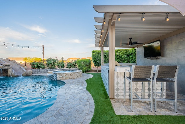 22771 N 98th Dr, Peoria, AZ 85383 - view of pool with ceiling fan, a fenced backyard, a water slide, and a pool with connected hot tub