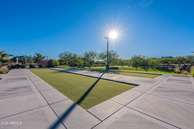22771 N 98th Dr, Peoria, AZ 85383 - view of home's community with a game area and fence