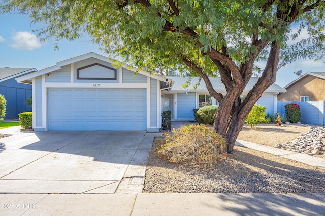 single story home with a garage