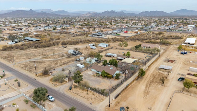 birds eye view of property featuring a mountain view