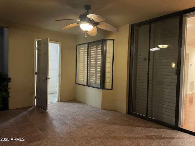 unfurnished bedroom with ceiling fan