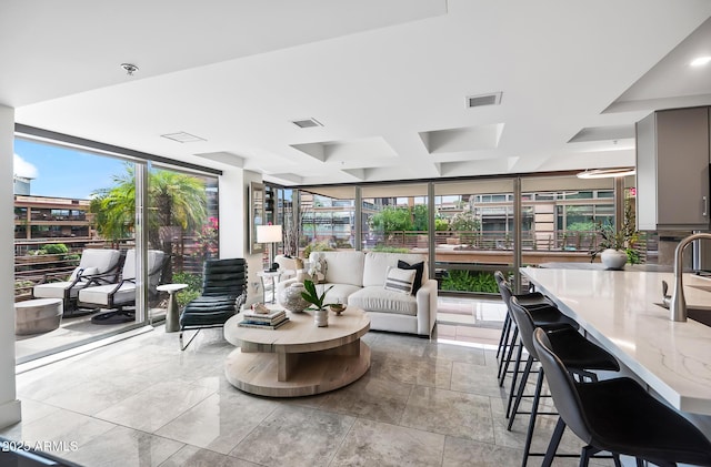 7141 E Rancho Vista Dr Unit 6007, Scottsdale, AZ 85251 - living area with floor to ceiling windows, coffered ceiling, and beam ceiling