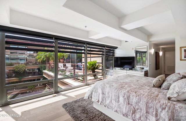 7141 E Rancho Vista Dr Unit 6007, Scottsdale, AZ 85251 - bedroom featuring wood finished floors