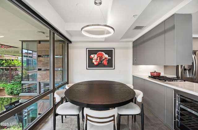 7141 E Rancho Vista Dr Unit 6007, Scottsdale, AZ 85251 - dining area with beverage cooler