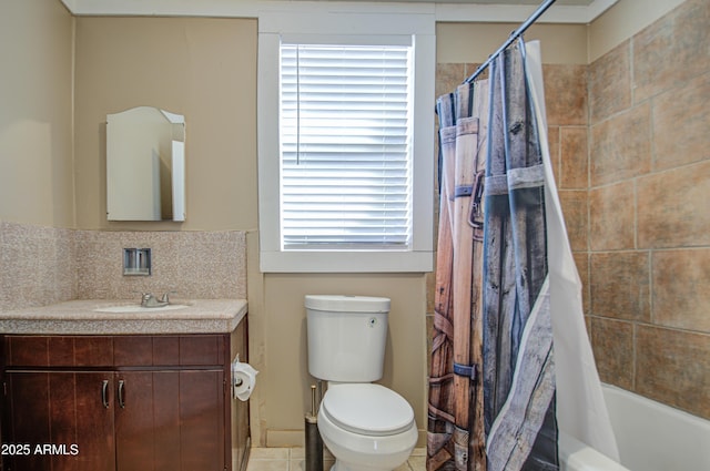 full bathroom featuring tasteful backsplash, vanity, shower / tub combo, and toilet