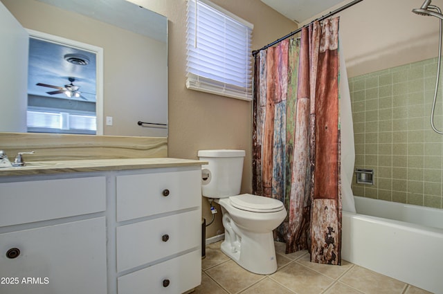 full bathroom featuring ceiling fan, shower / bath combo, tile patterned flooring, vanity, and toilet