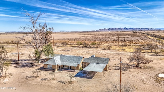 drone / aerial view with a mountain view and a rural view