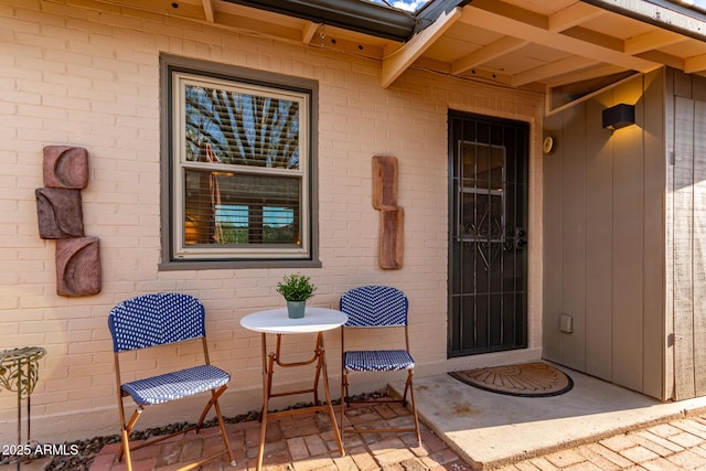 doorway to property featuring a patio