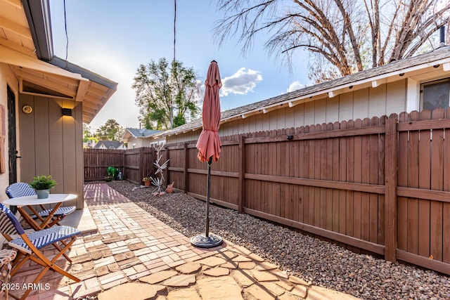 view of patio featuring a fenced backyard
