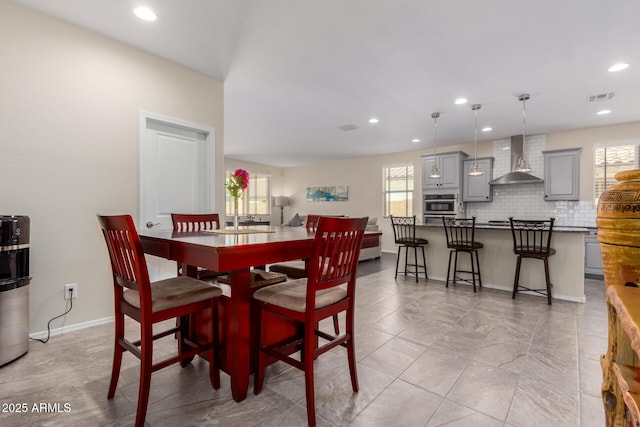 dining space featuring a wealth of natural light