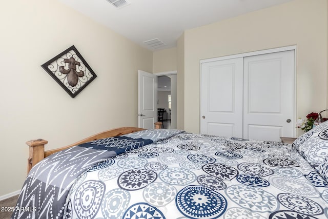 bedroom with carpet floors and a closet