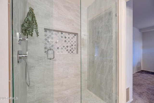 bathroom with an enclosed shower