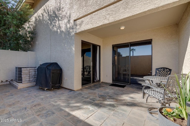 view of patio with a grill