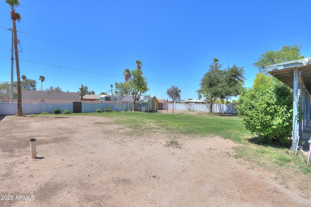 view of yard with fence