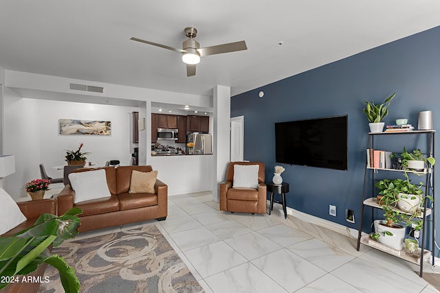 living room featuring ceiling fan