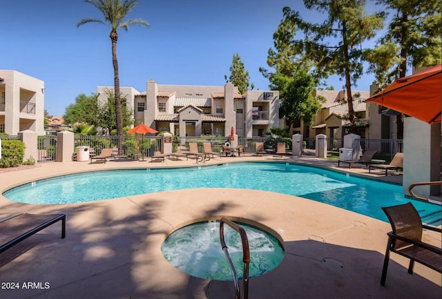 view of swimming pool featuring a patio