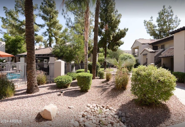 view of yard with a community pool