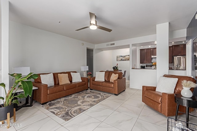 living room with ceiling fan