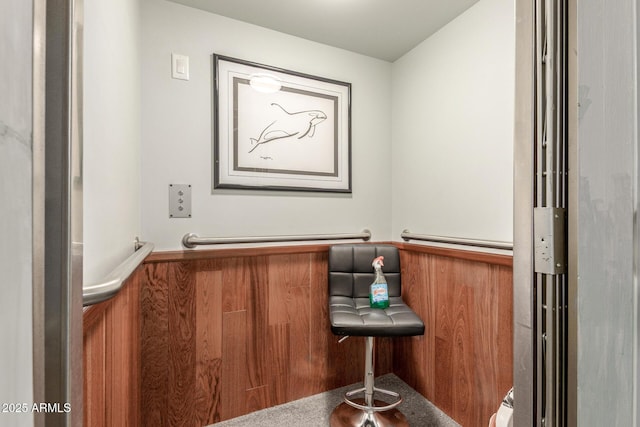 bathroom featuring a wainscoted wall