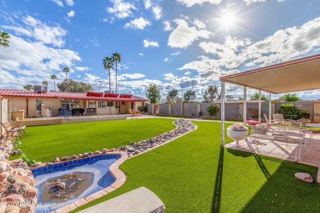 view of yard with a patio, cooling unit, and a fenced backyard