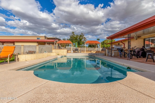 view of pool with a patio area, a fenced in pool, and a fenced backyard