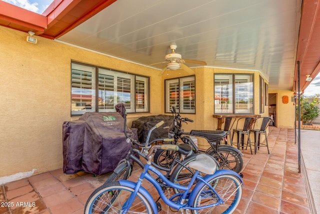 view of patio with a ceiling fan