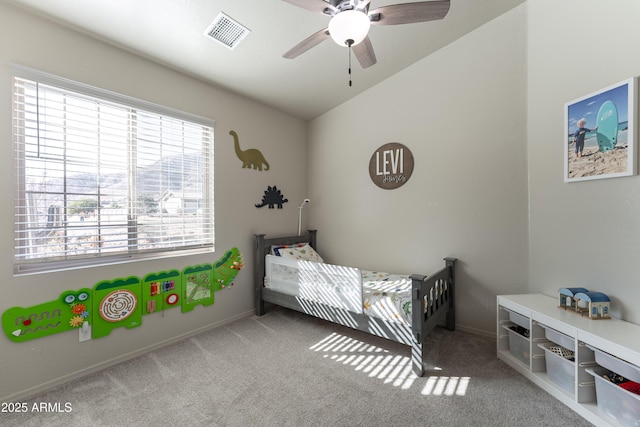 bedroom with ceiling fan, carpet, and lofted ceiling