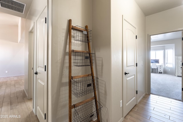 hall featuring light hardwood / wood-style flooring