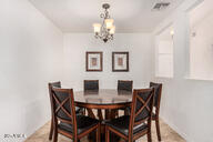 dining room featuring an inviting chandelier