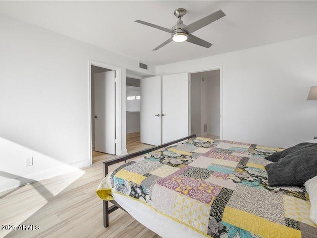 bedroom featuring ceiling fan and light wood-type flooring