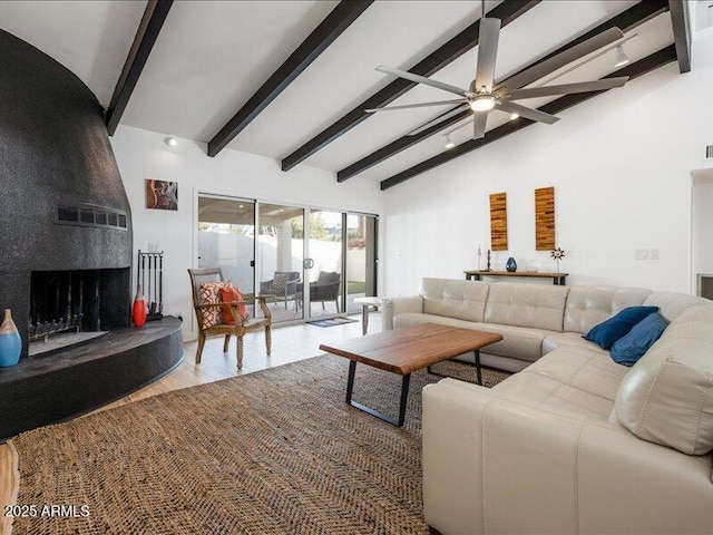 living room with light hardwood / wood-style flooring, ceiling fan, beam ceiling, high vaulted ceiling, and a fireplace