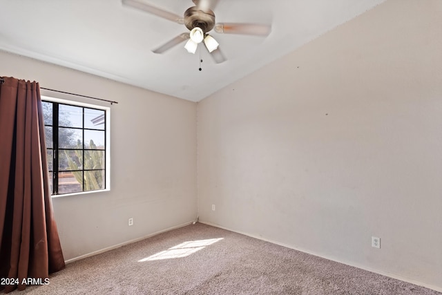 unfurnished room featuring ceiling fan and carpet floors