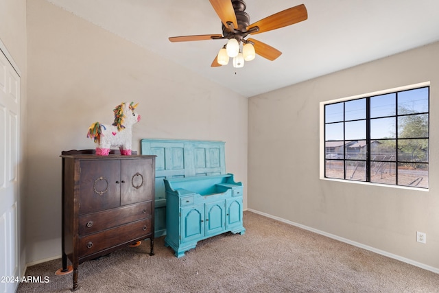 bedroom featuring light carpet