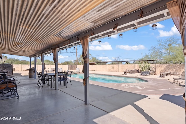 view of swimming pool featuring a patio