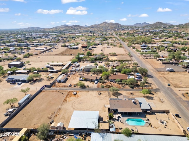 drone / aerial view featuring a mountain view