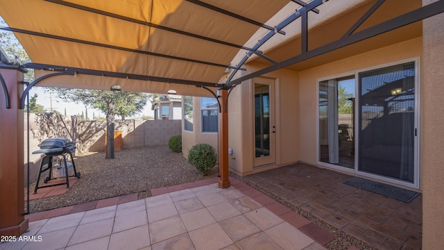 view of patio / terrace with fence and area for grilling