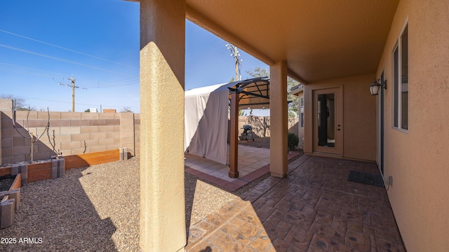 view of patio featuring a fenced backyard