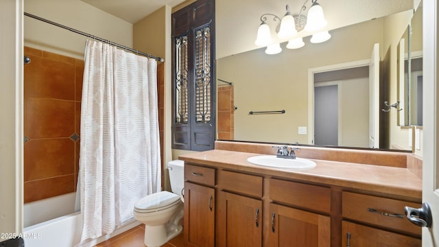 bathroom featuring shower / bath combination with curtain, vanity, and toilet