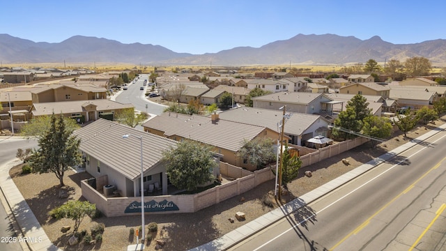 bird's eye view with a mountain view and a residential view