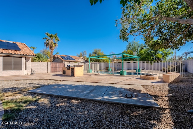 exterior space featuring a patio area and a pool