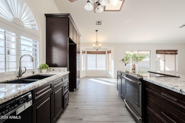 kitchen featuring black dishwasher, stainless steel electric range oven, a healthy amount of sunlight, and sink