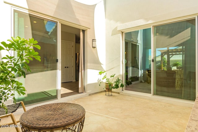 10447 W Salter Dr, Peoria, AZ 85382 - doorway to property with a patio and stucco siding