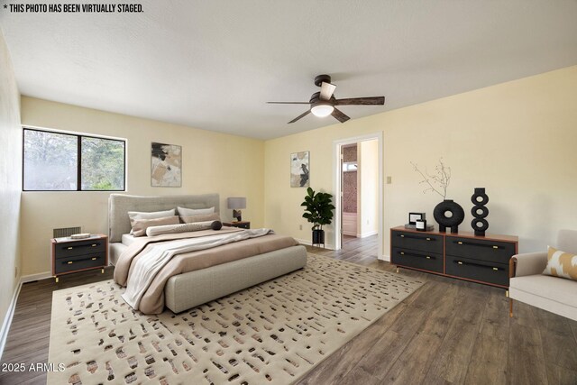 103 E Glade Ln, Payson, AZ 85541 - bedroom featuring wood finished floors and a ceiling fan