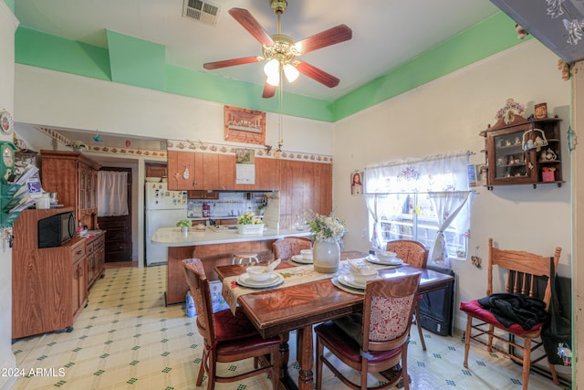 dining area with ceiling fan