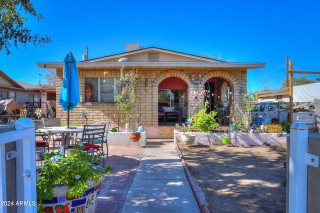 view of front of property with a patio